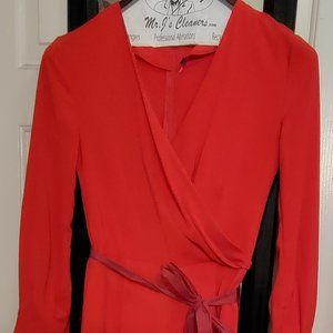 Red long sleeve  v neck jumpsuit.